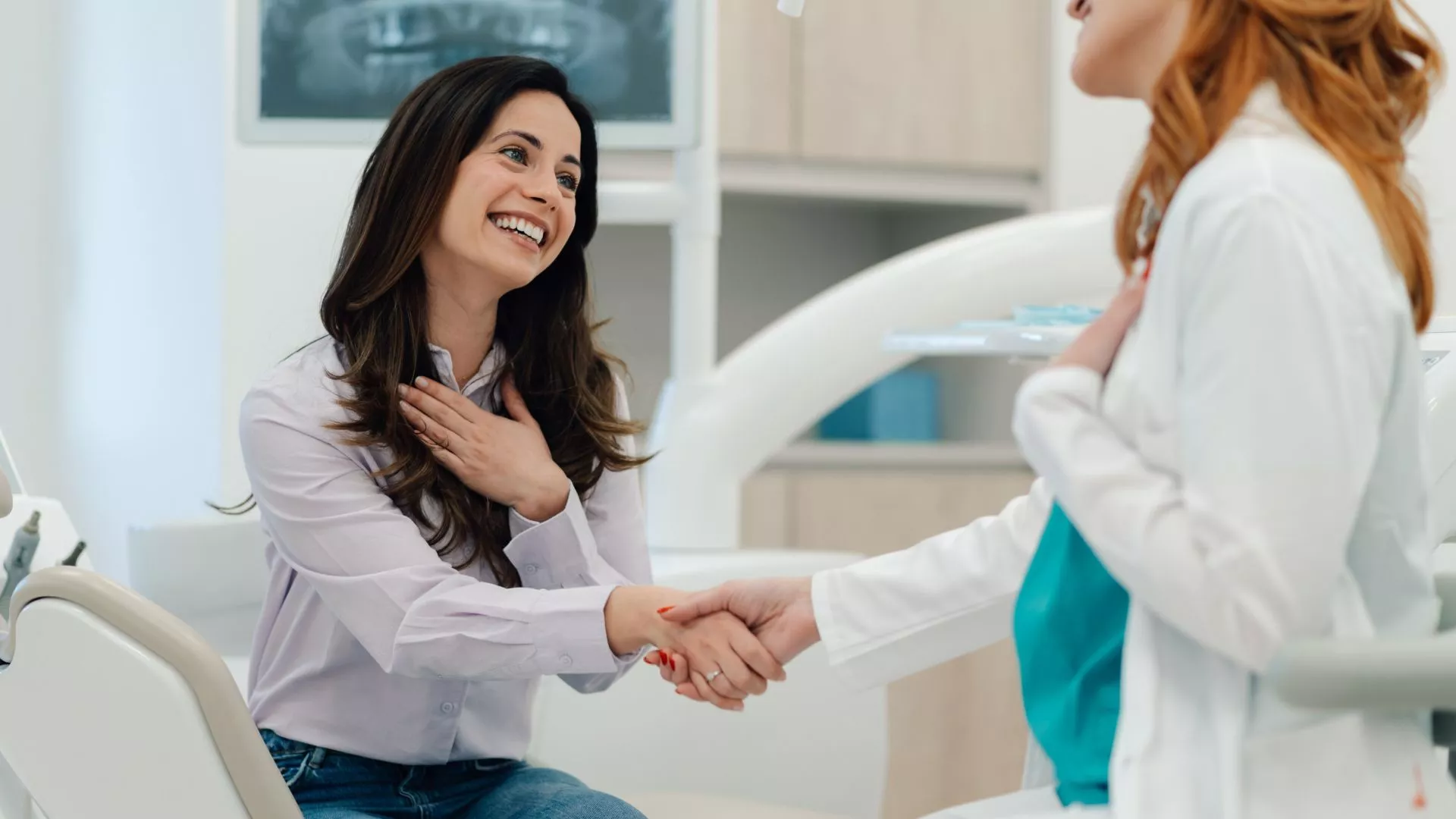 Patient And Dentist Greeting In The Clinic