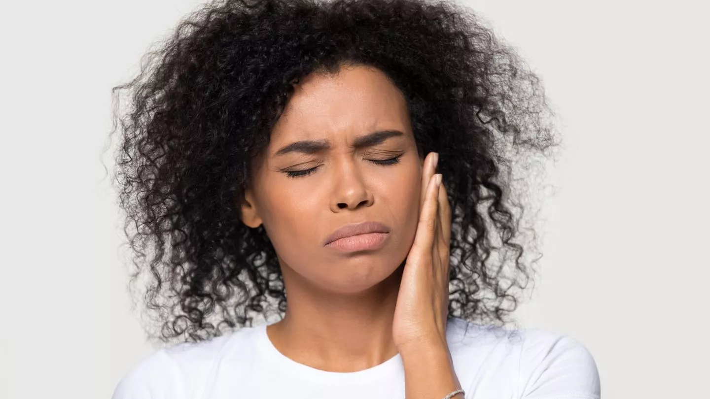 Woman Suffering From Tooth Pain